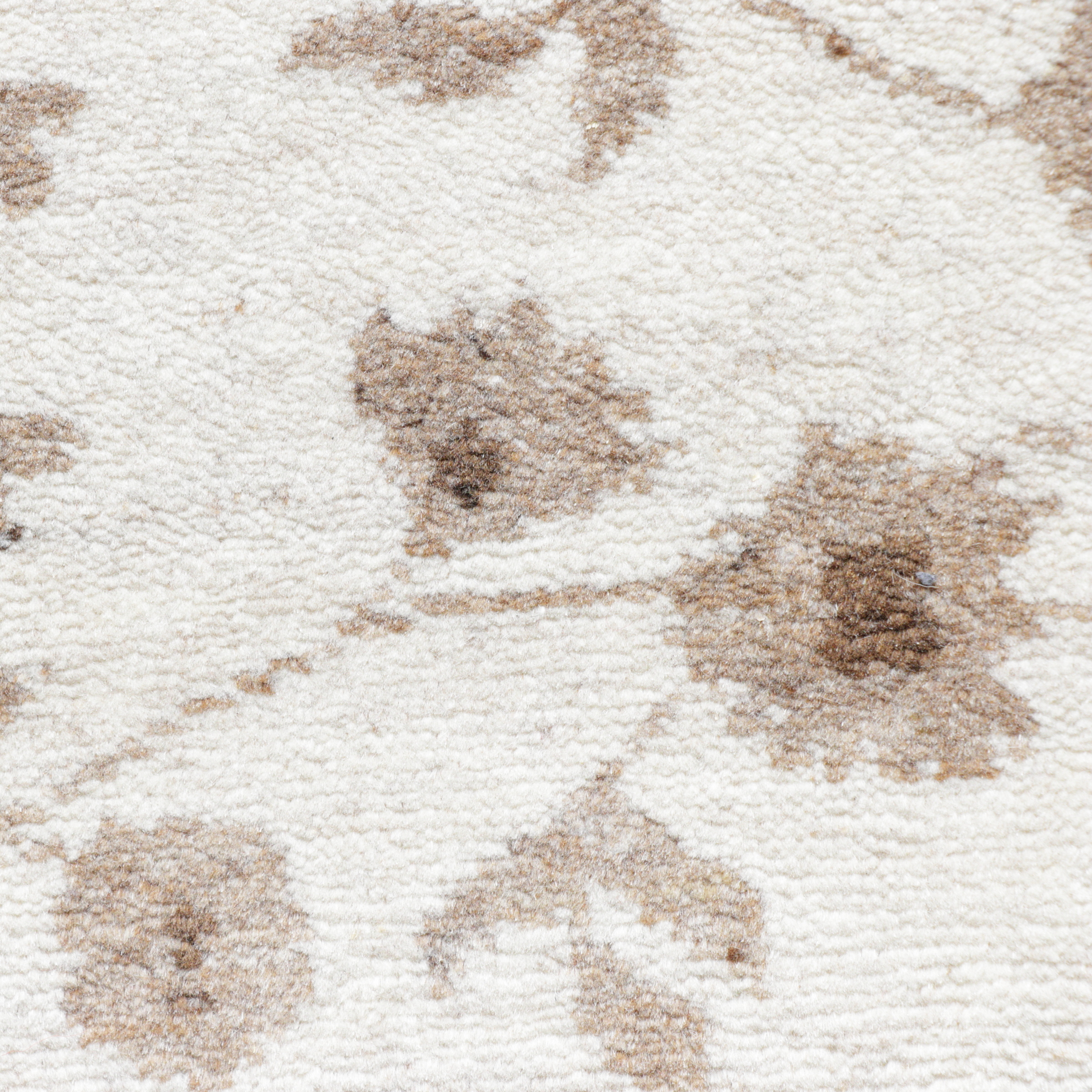 Natur-Pur Teppich beige/sand, handgeknüpft aus sardischer Wolle mit floralem Mittelfeld, Detailansicht